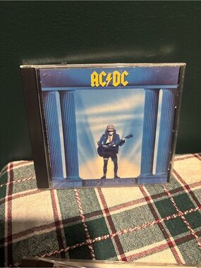 AC/DC Blue and Yellow 'Who Made Who' Album Cover Art